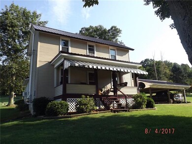 Newer Tin roof and Vinyl siding with 20x 6 Covered