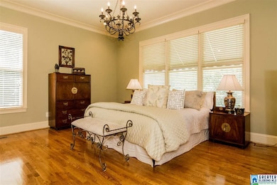 Gorgeous master suite on the main level! Hardwoods and crown molding. Perfect retreat after a long day!
