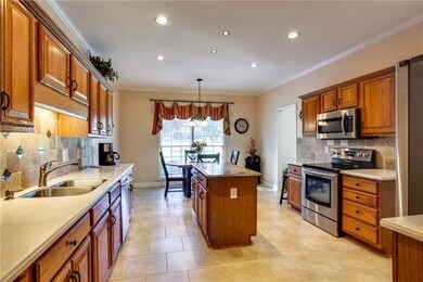 Beautiful Tile Floors, Oak Cabinets, Solid Surface