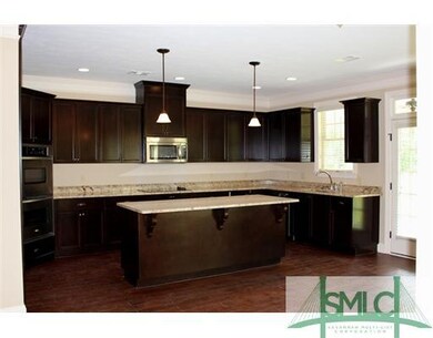 Kitchen. Picture of Same Home Completed on Differe