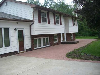 Exterior Front. Stamped concrete.  Front sitting a