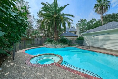 Photo of pool  in fenced backyard