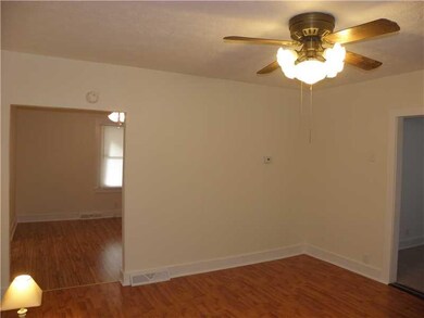 Living Room. Large 12x13 Living Room w/ Newer Floo