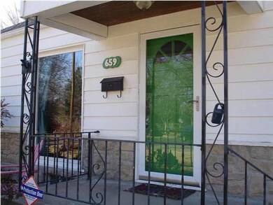 Covered front porch and a huge picture window that