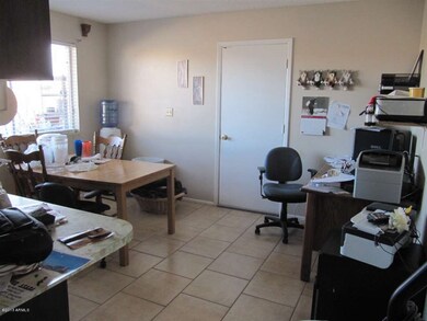 Eat-in kitchen with tile floors