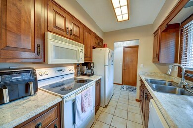 Plenty of prep space and tile floors.