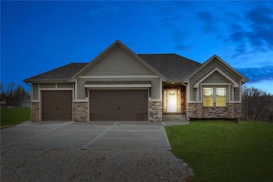 834 Switch Grass Court, Raymore, MO 64083 is a cus