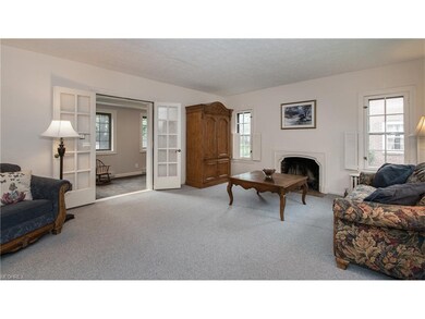 BEFORE; LIVING ROOM WITH DEN/OFFICE. CHECK OUT NEX
