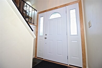 Foyer & Front Door to Upper and Lower level