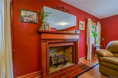 Brick woodburning fireplace with gas logs insert i