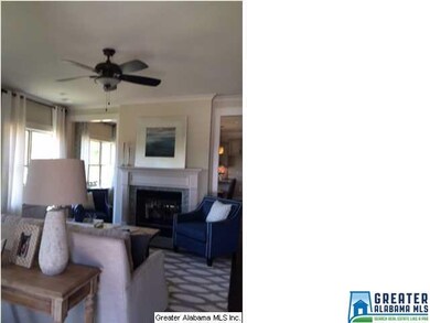 Living area with hardwoods and sitting area.