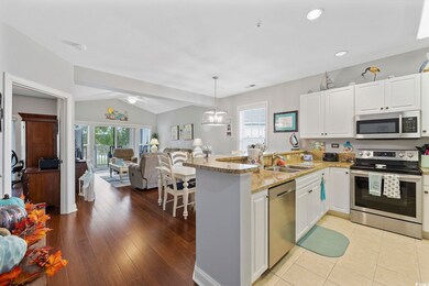 Kitchen with appliances with stainless steel finis