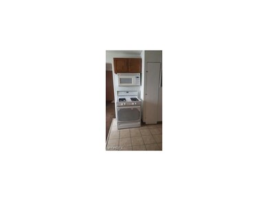 Kitchen with ceramic flooring