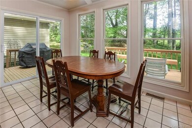 Eat-in Kitchen: Surrounded by windows, this area f