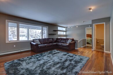 Spacious Living room w/hardwood flrs.