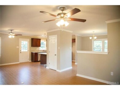 Family room overlooking kitchen, and dining room.