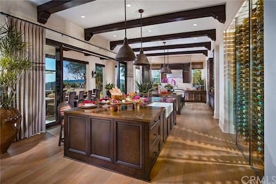 Gourmet kitchen with dual islands and wine room