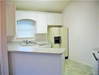 This kitchen photo appears to have a purple tint. 