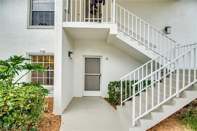Entry with landscaping.