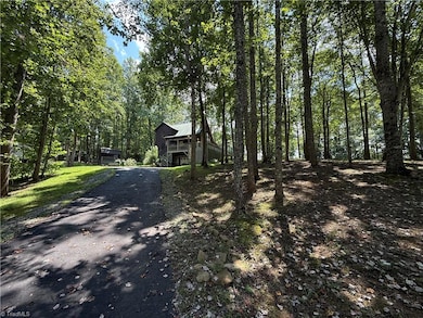 Looking up driveway to home