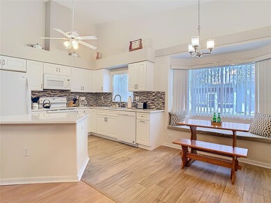 Kitchen has sitting space for a table and chairs.