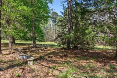 View of yard with a forest view