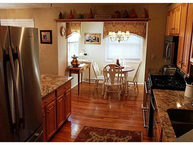 Kitchen. Beautifully updated!  Granite, stainless steel Jennair appliances include a 5-burner convection oven.  Measures 11 x9 .