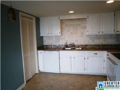 Kitchen with granite counter tops.