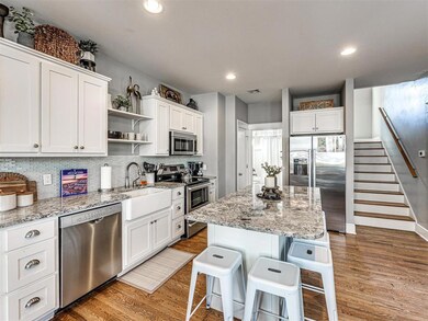 Kitchen with appliances with stainless steel finis