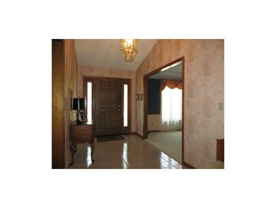 Vaulted and tiled entry hall
