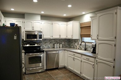 Solid surface counters, backsplash, cabinets, ligh
