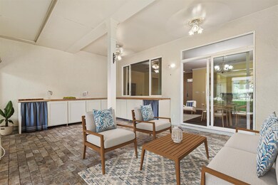 View of patio with an outdoor living space