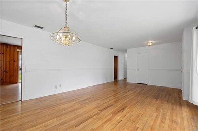 View of the dining room and the living room.