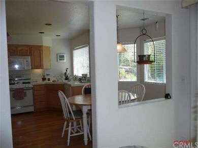 Viewing from the formal dining area into the kitch