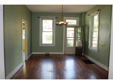 Dining Room. Bright Dining Room with Door to Back 