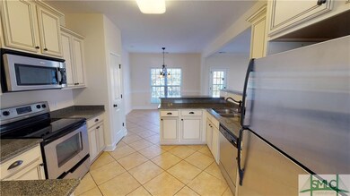 Stainless steel appliances. Clean neutral colors. 