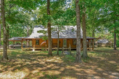 Wrap around porch on this awesome log home