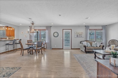 Main living area is large with updated flooring an