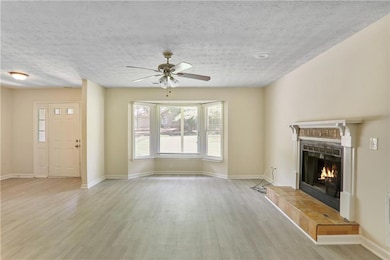 Unfurnished living room with light wood-type floor