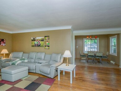 Living room comfortably close to dining room witho