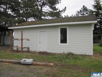Side of detached garage.