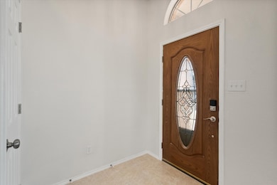 Foyer with baseboards