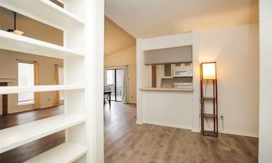 Wide and bright entry stands out with built in she