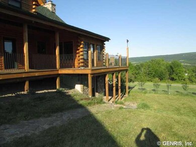 Exterior Back LARGE UPPER DECK AND LOWER PATIO FRO