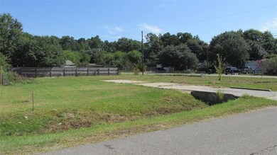 Fantastic corner lot that's almost a 1/4 acre- ready for your mobile home!