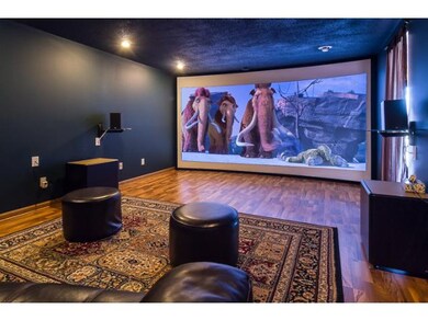 Lower level family room is being used as an in hom