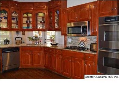 Open kitchen with lots of cabinets...granite count