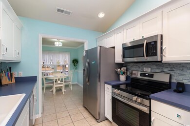 Kitchen with visible vents, stainless steel applia