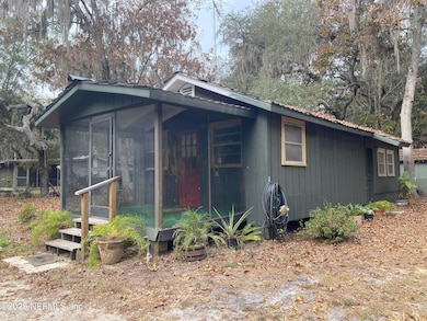 8093 Breezy Point Rd E, Melrose, FL 32666 - photo 2