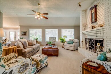 Living room with wonderful fireplace feature and w